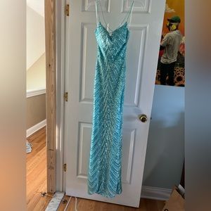 Beautiful turquoise blue prom dress! Never worn and in perfect condition